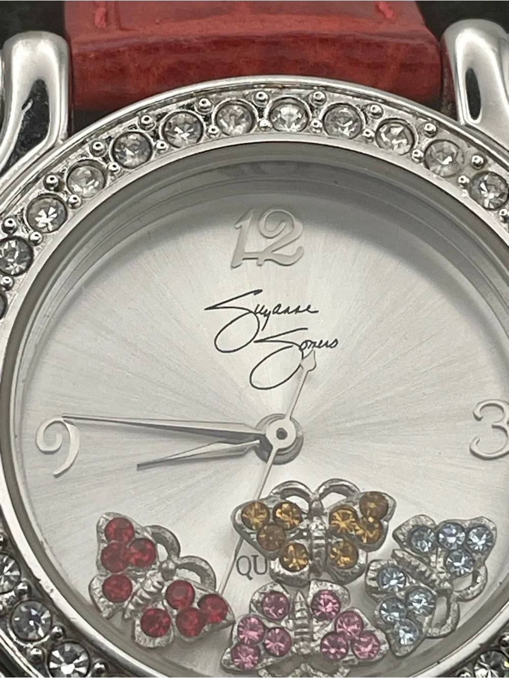 Suzanne Somers Watch with Floating 4 Rhinestone Butterflies. Red Leather Band